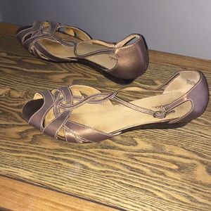 Clark’s sandals. Brownish/ metallic color.